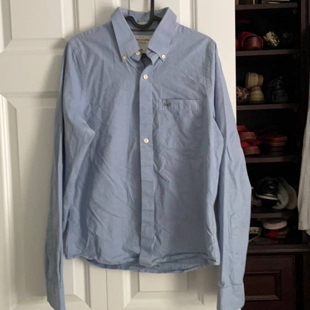 Medium blue men’s or boy’s dress shirt